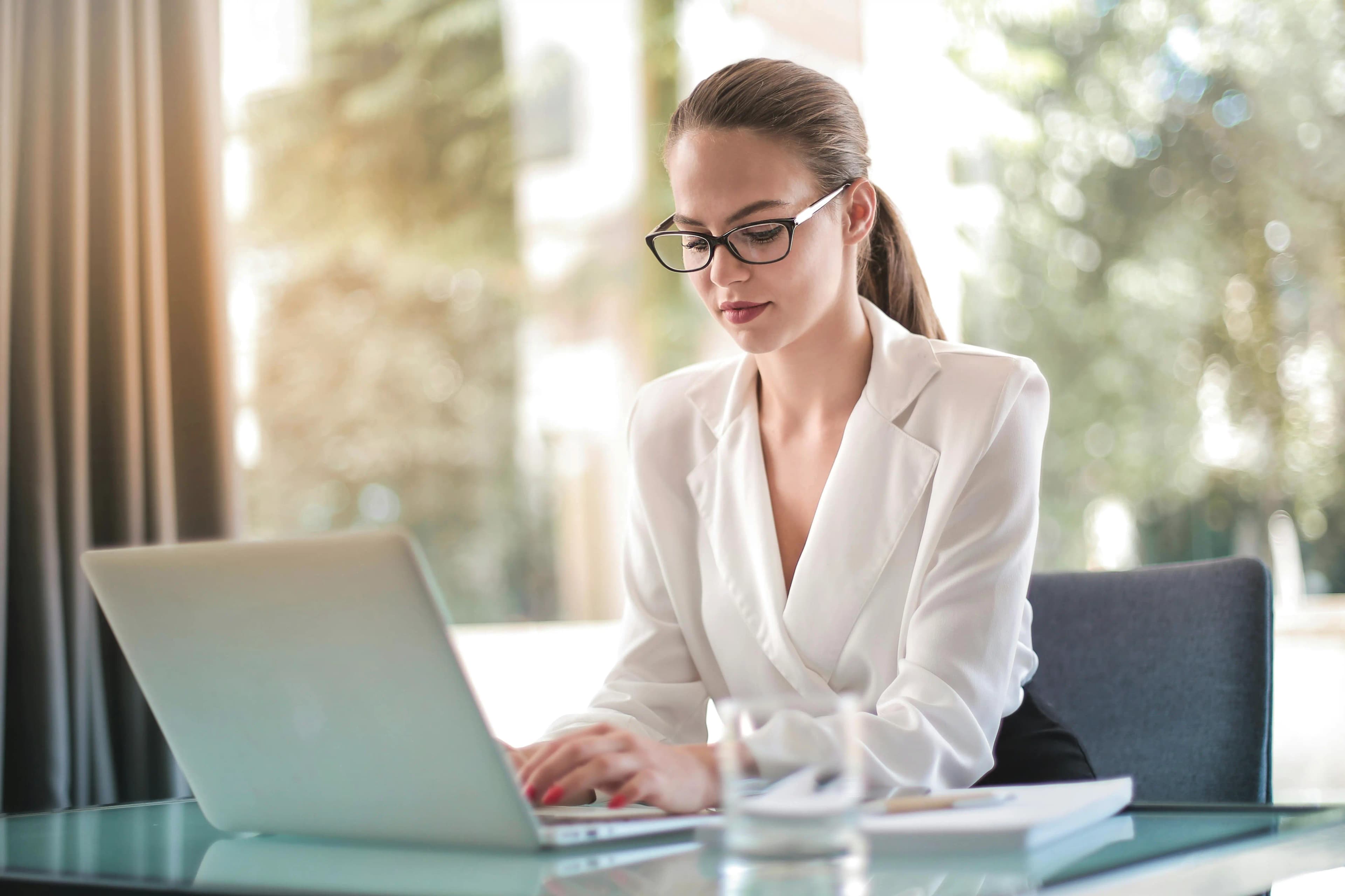 A woman taking a quiet moment to think through her finances